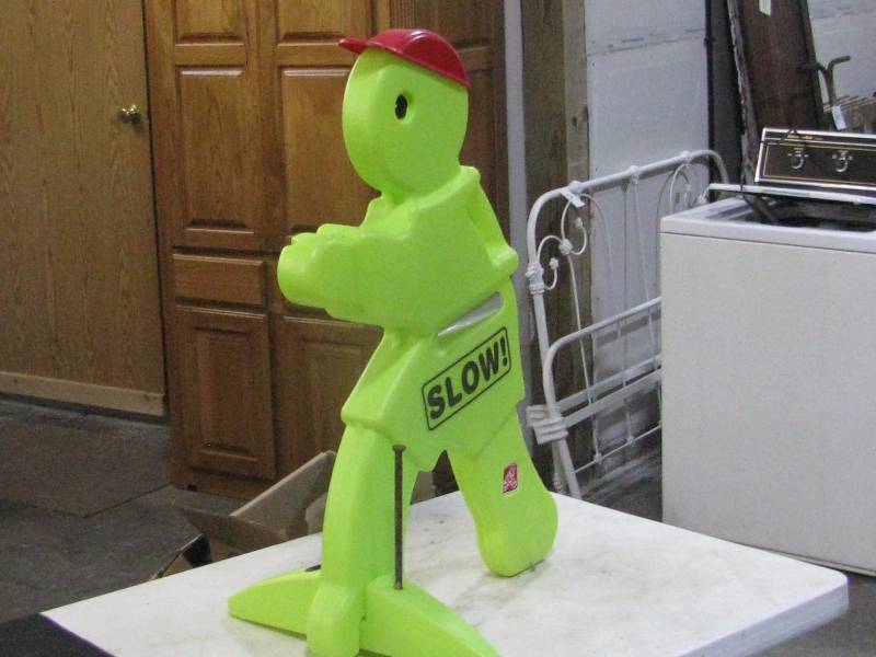 lot 45 image: Plastic Slow Sign