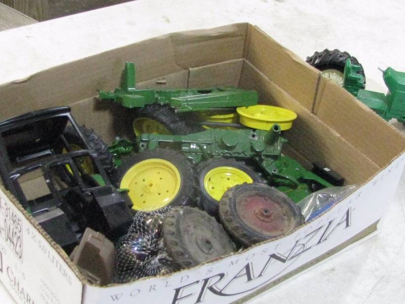 lot 69 image: Die Cast Toy Tractor Parts