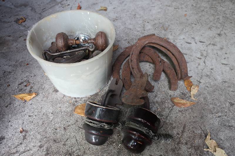 OLD HORSE SHOES, INSULATORS AND DOOR HARDWARE