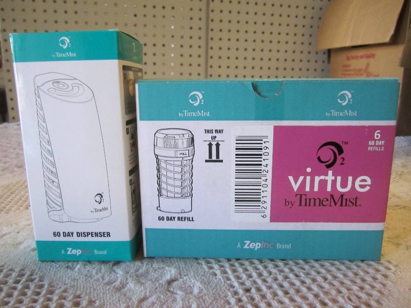lot 12 image: Time Mist 60 Day Air Freshener Disp...