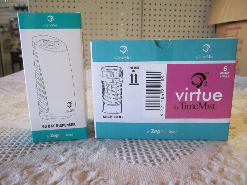 lot 14 image: Time Mist 60 Day Air Freshener Disp...