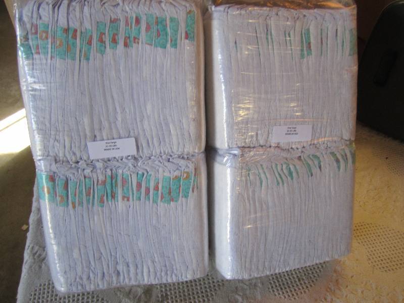 lot 66 image: Lot of 100 Diapers 2 packs of 50 ea...