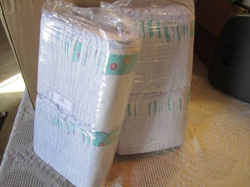 lot 71 image: Lot of 100 Diapers 2 packs of 50 ea...