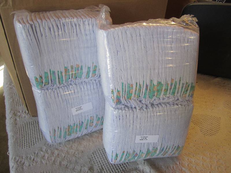 lot 72 image: Lot of 100 Diapers 2 packs of 50 ea...
