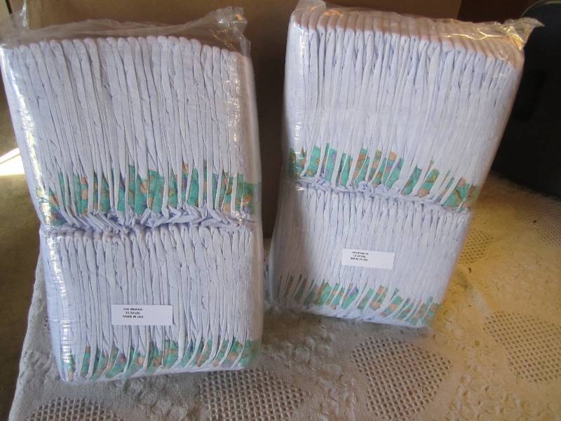 lot 77 image: Lot of 100 Diapers 2 packs of 50 ea...