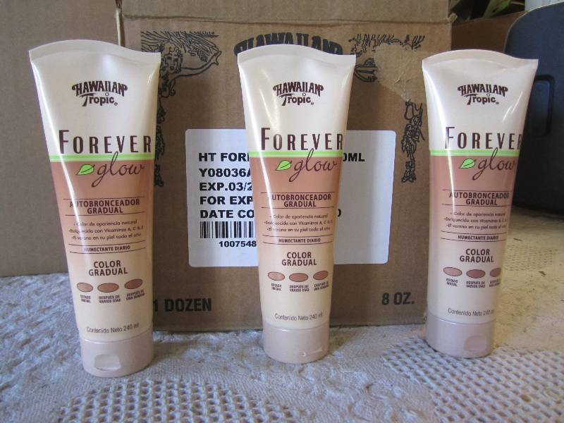 lot 117 image: Case of 12 Hawaiian Tropic Forever ...