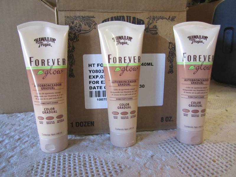 lot 118 image: Case of 12 Hawaiian Tropic Forever ...