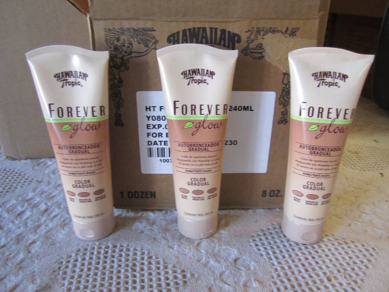 lot 122 image: Case of 12 Hawaiian Tropic Forever ...