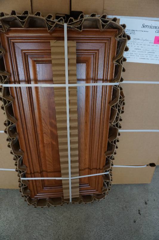 lot 6 image: 34 Kitchen Cabinet Door Fronts Savannah Brand Pecan Color