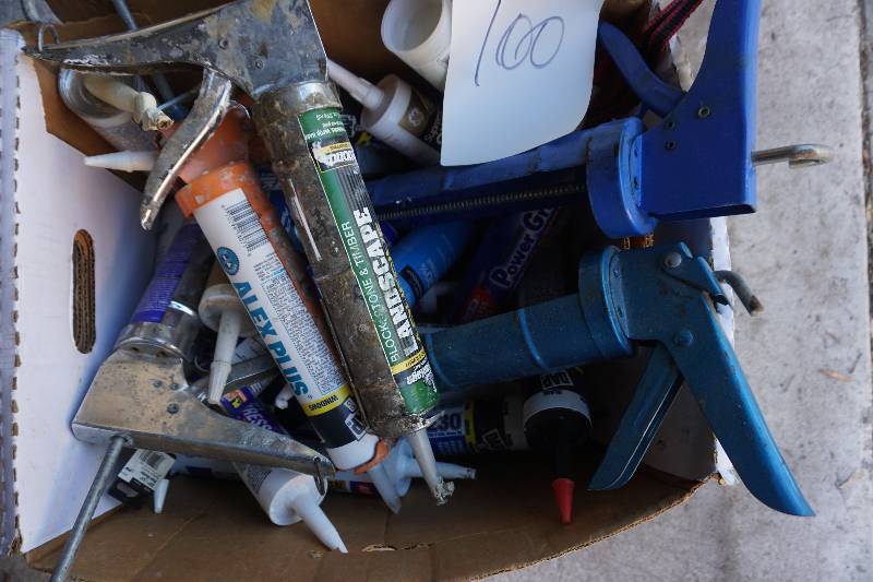 lot 100 image: Box of Caulking Guns and Assorted Caulk