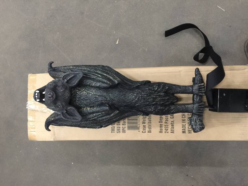 lot 8 image: 9 in. x 7 in. x 24 in. Life Size Animated Rocking Bat