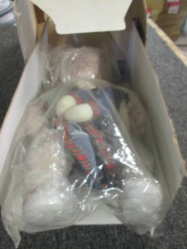 2 dolls both look new in box 1 is a...
