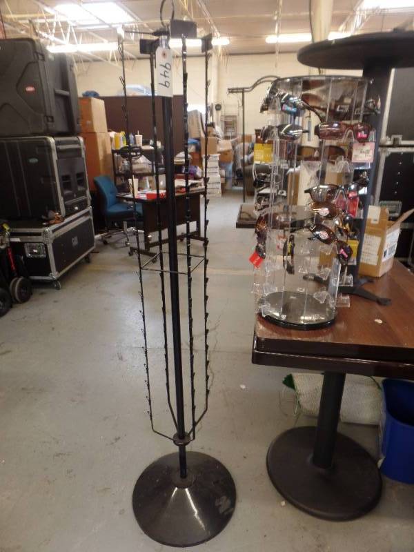 lot 949 image: SUNGLASS DISPLAY RACK WITH SUNGLASSES AND EXTRA RACK