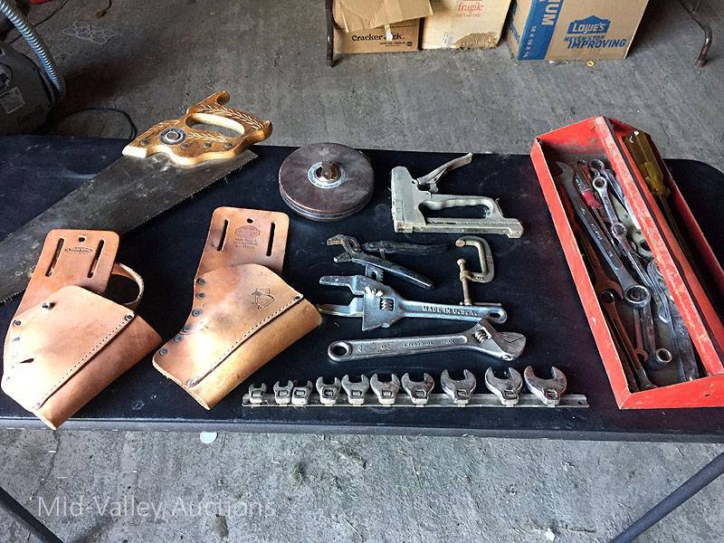lot 251 image: Saw, Holsters, and more