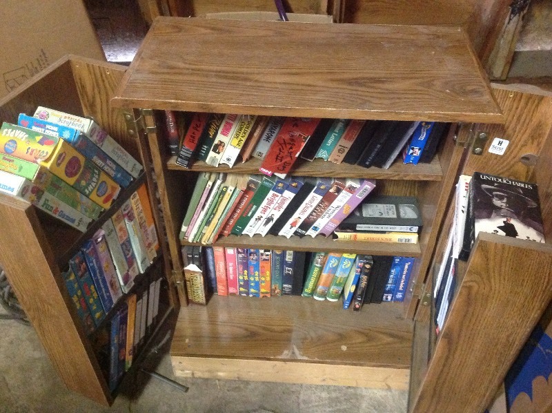 lot 305 image: Video case & Books