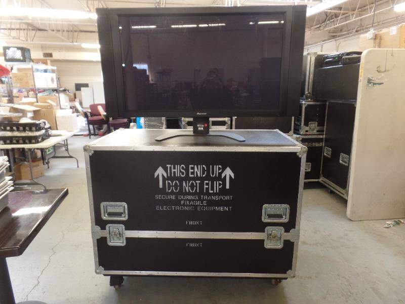 lot 3 image: 50 PLASMA MONITOR WOTH ROAD CASE