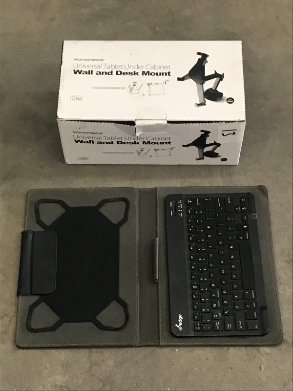 lot 13 image: Lot Of (1) Universal Tablet Under-C...