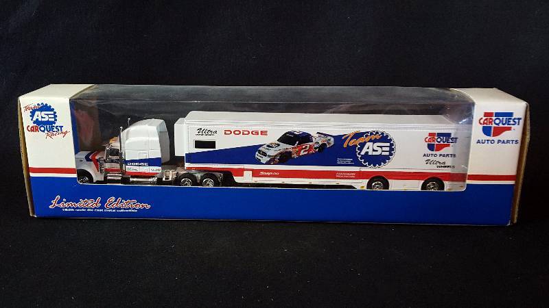 lot 261 image: Carquest Team ASE Race Car Rig 164 Die Cast
