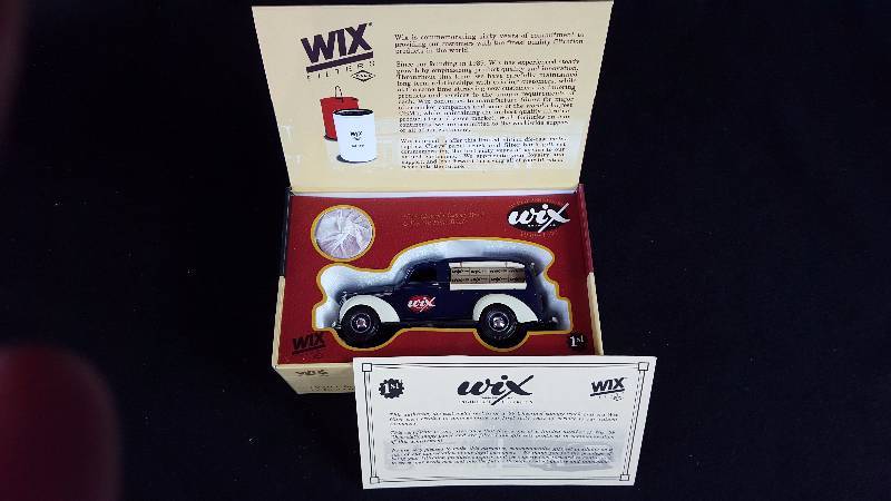 lot 285 image: Ertl Wix Filters 1939 Chevy Canpy Panel Die Cast Metal Bank