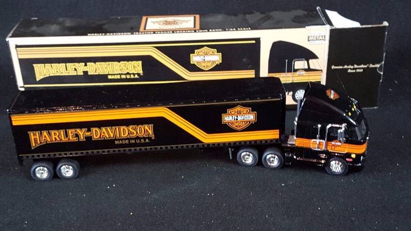 lot 322 image: Harley Davidson Semi Truck Die Cast Coin Bank
