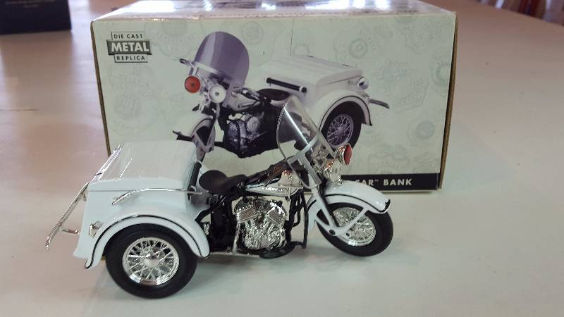 lot 329 image: Harley Davidson 1947 Police Servi Car Die Cast Coin Bank