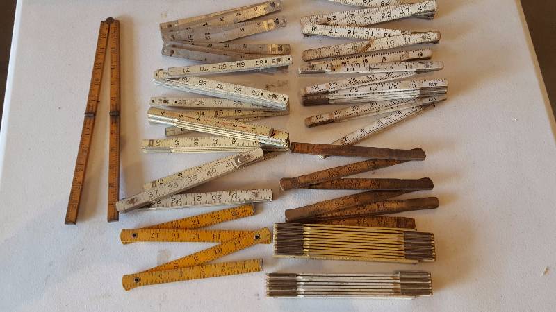 lot 70 image: Vintage Folding Rulers.