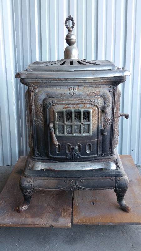 lot 2 image: Antique Wood Burning Stove