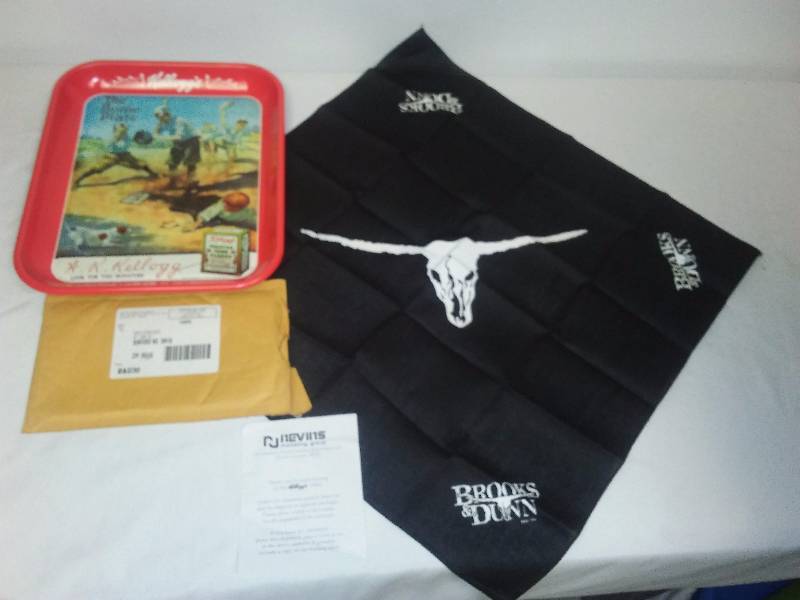lot 42 image: Kelloggs Tray (13 x10.5) and Brooks and Dunn Bandana Scarf (21 inches square Both are promotional items from Kelloggs