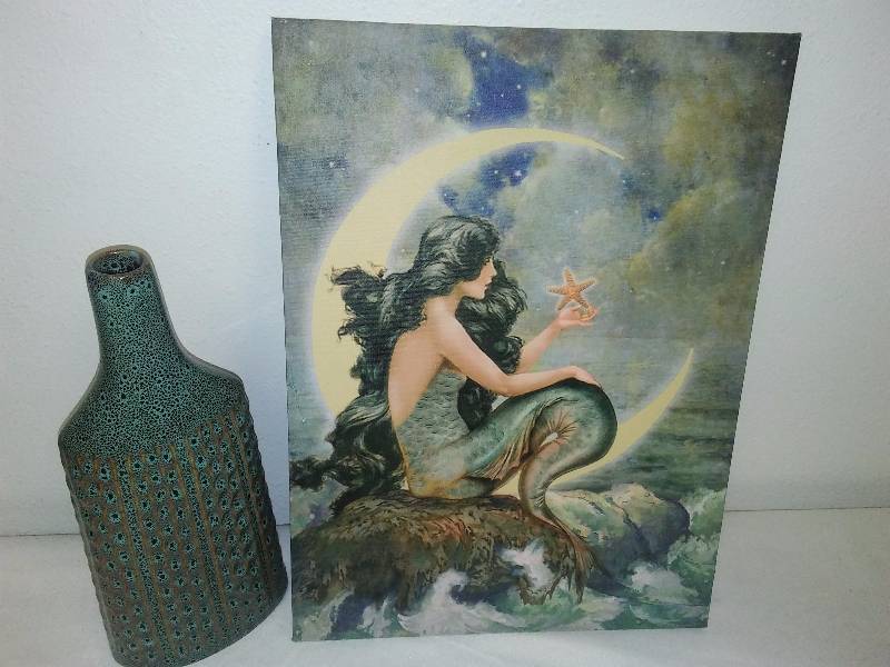 lot 54 image: Mermaid Canvas Print and Pottery Vase