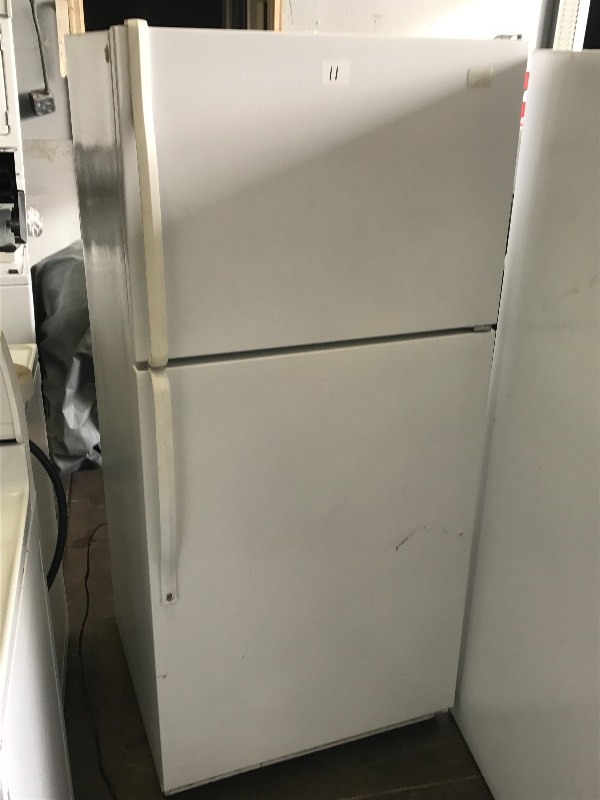 lot 11 image: Whirlpool Refrigerator With Freezer...