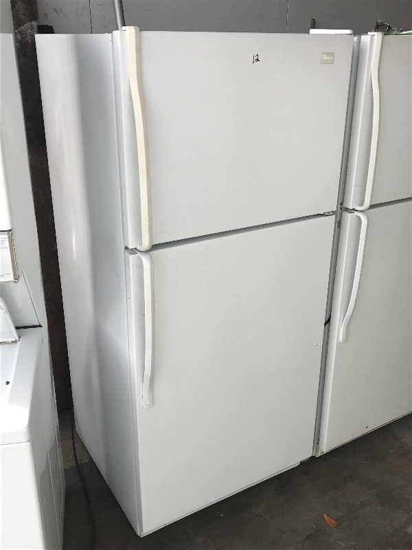 lot 12 image: Whirlpool Refrigerator With Freezer...