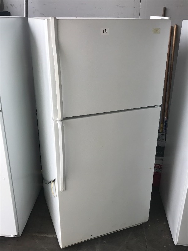 lot 13 image: Whirlpool Refrigerator With Freezer...
