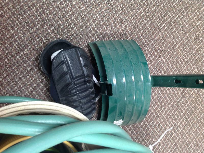 lot 24 image: Garden hose, Hose Wall Hanger, Knee Pads, Plant Pots