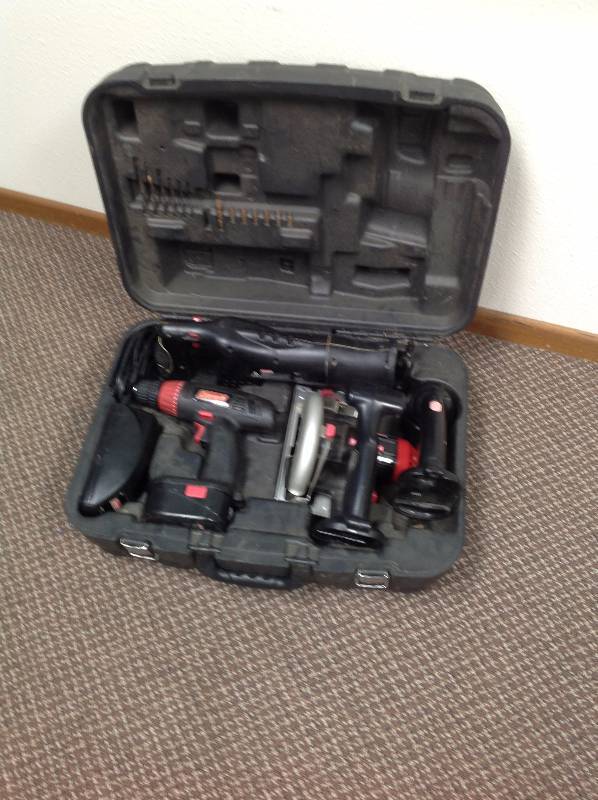 lot 53 image: Coleman Case with Drill, Reciprocating Saw, Circular saw, and Light and charger