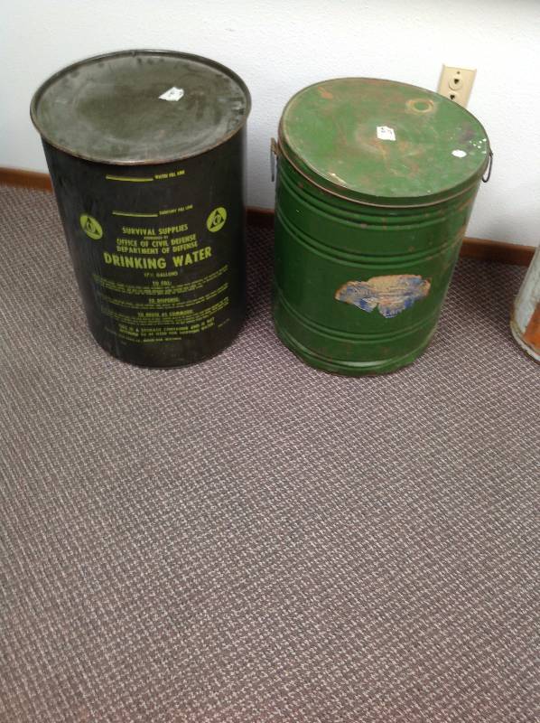 lot 57 image: Two Vintage Survivor Cans