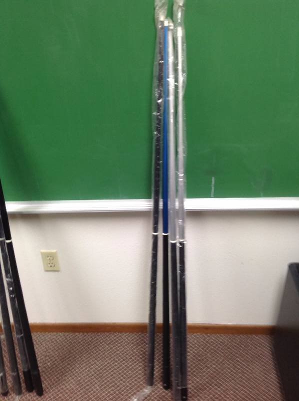 lot 69 image: Four Pool Sticks
