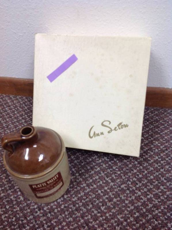 lot 86 image: Empty Hat box and Whiskey Jug