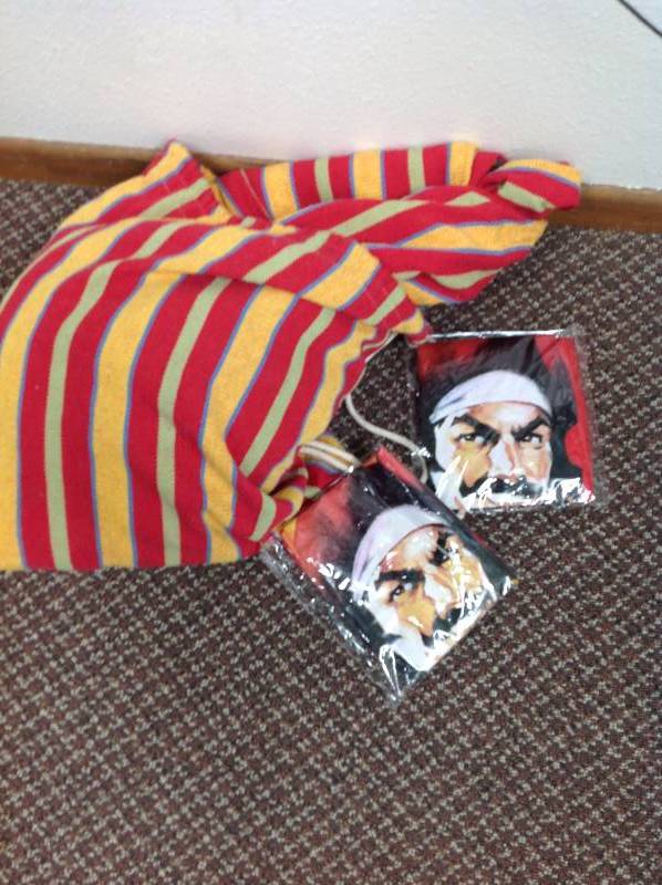 lot 92 image: Weave Hammock and two Captain Morgan Beach Balls
