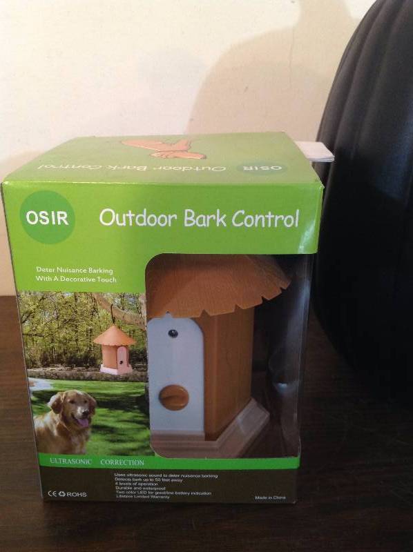 lot 14 image: Outdoor Bark Control, Orange and Black Fake Pumpkin