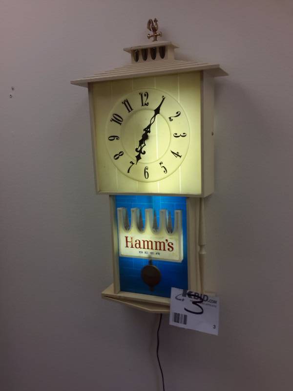Hamms Beer Lighted clock with electric Pendulum.. 24 in tall