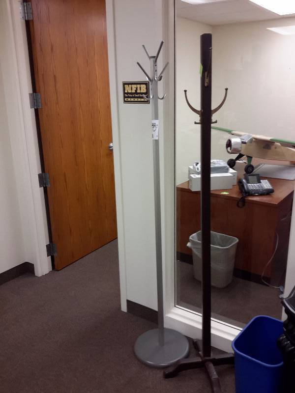 2 nice upright Coat Racks.. 1 metal, 1 wood
