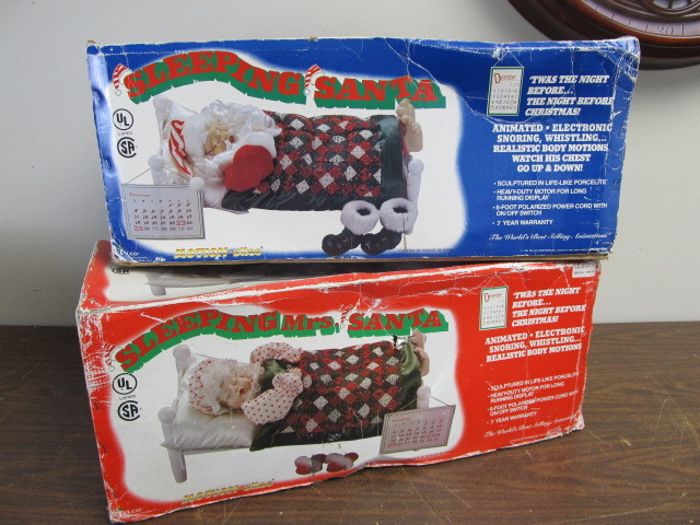 lot 66 image: Large Animated Sleeping Santa & Mrs. Clause 