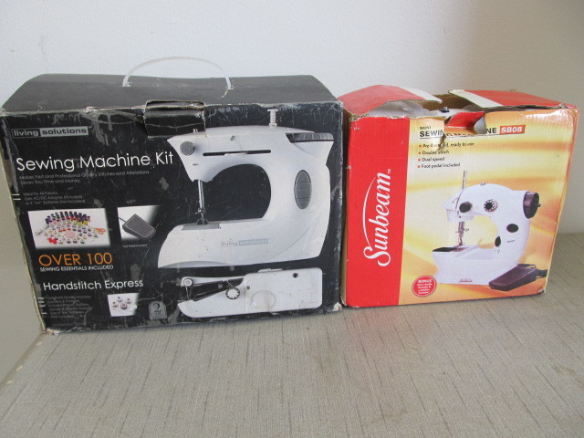 lot 141 image: 2 Portable Handheld Sewing Machines
