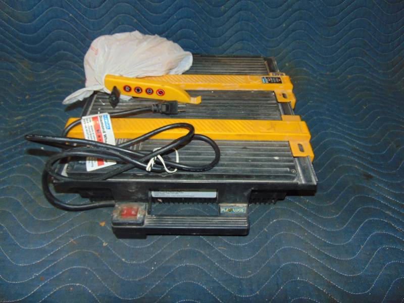 lot 64 image: Tile Saw