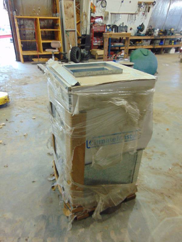 lot 128 image: Climate Master Heat Pump