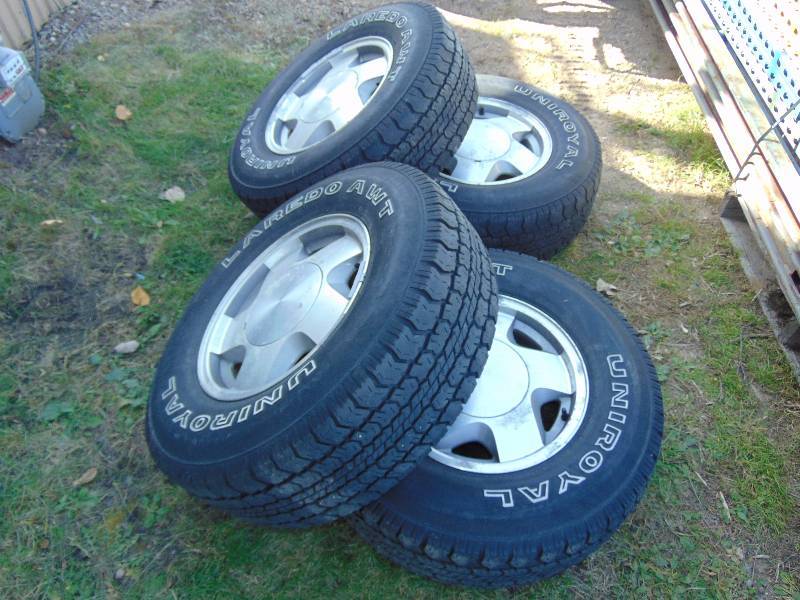 lot 4 image: Set Of Chevy Rims and Tires