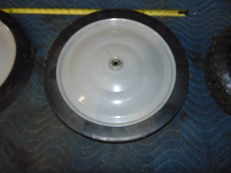 lot 136 image: (3) Wheels