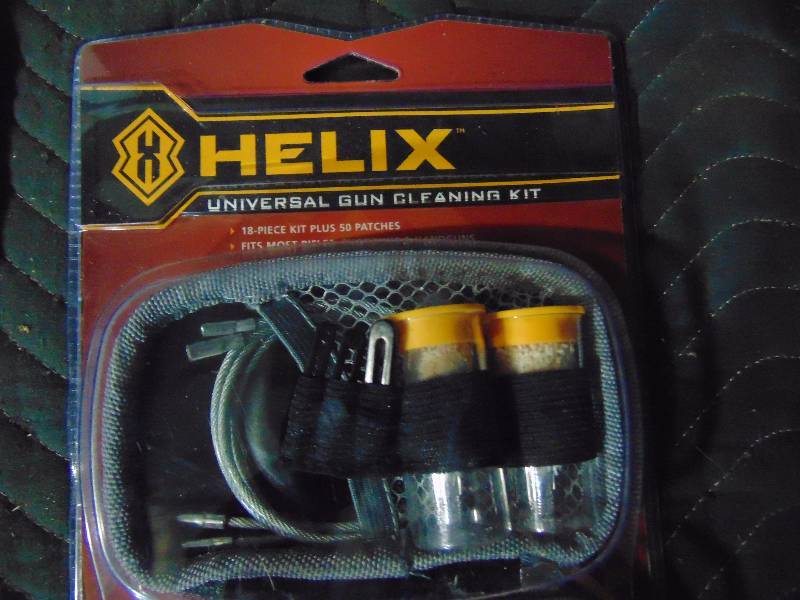 lot 167 image: Helix Universal Gun Cleaning Kit and Gun Sling