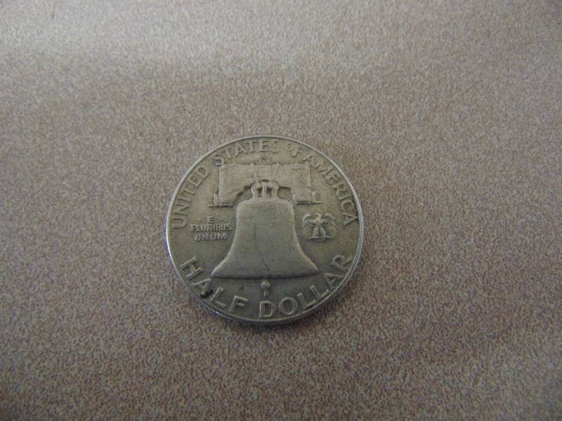 lot 217 image: (1) Silver Half Dollar