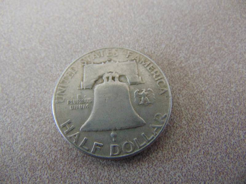lot 222 image: (1) Silver Half Dollar